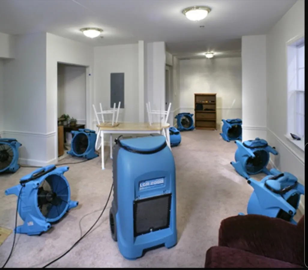 Air movers and dehumidifier setup for Water Damage Restoration in Albert Lea
